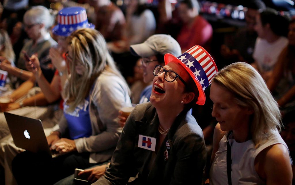 Supporters of U.S Democratic Presidential candidate Hillary Clinton react as a state is called in favour of her opponent, Republican candidate Donald Trump, during a watch party for the U.S. Presidential election, at the University of Sydney